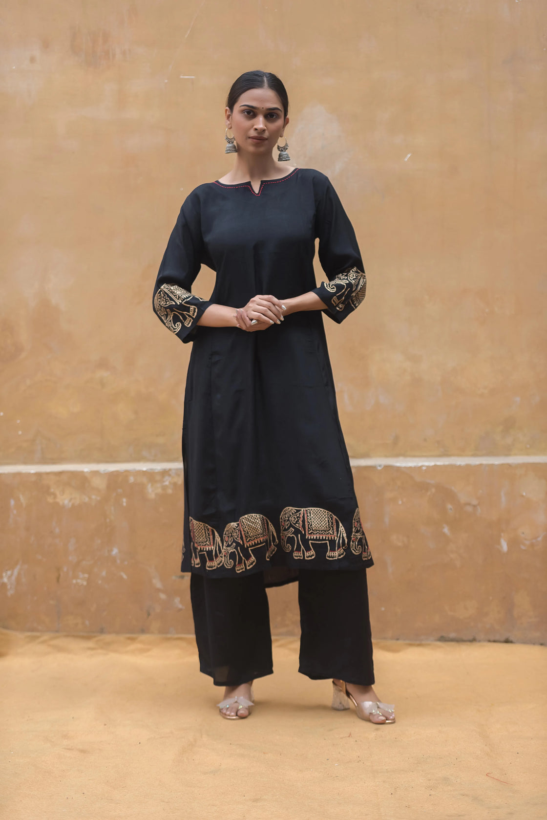 Woman in Black Muslin Kurti Pant Set Featuring Block Print & Katha Work – Versatile Style for Work & Casual Days.